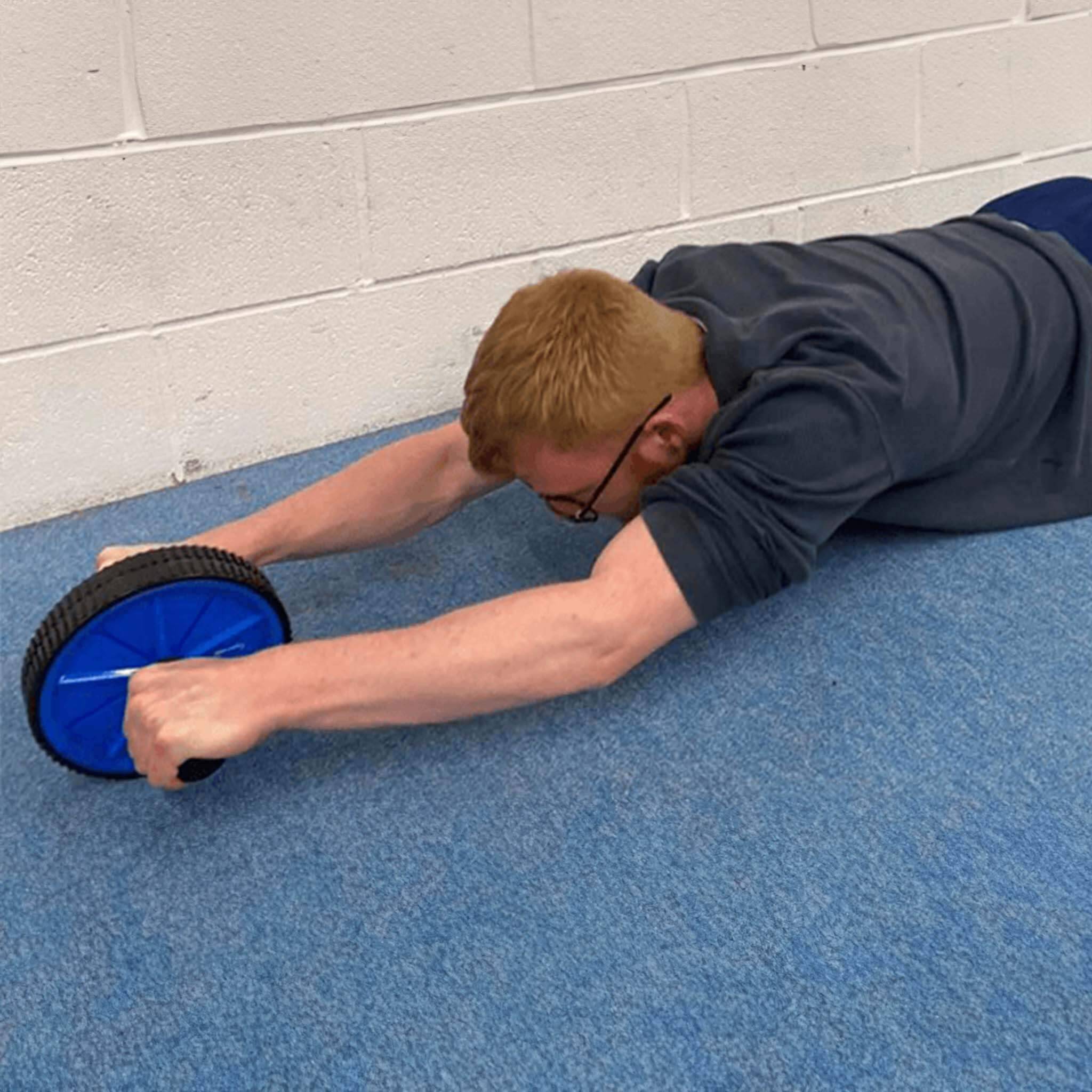 Gymaid Ab Wheel at use in the gym