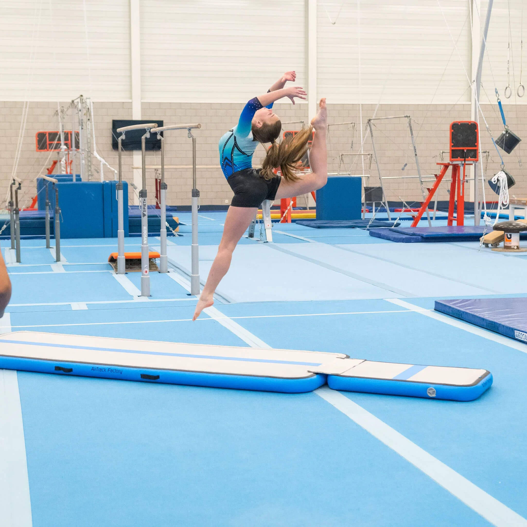 Gymnast training on AirFloor home and AirBoard